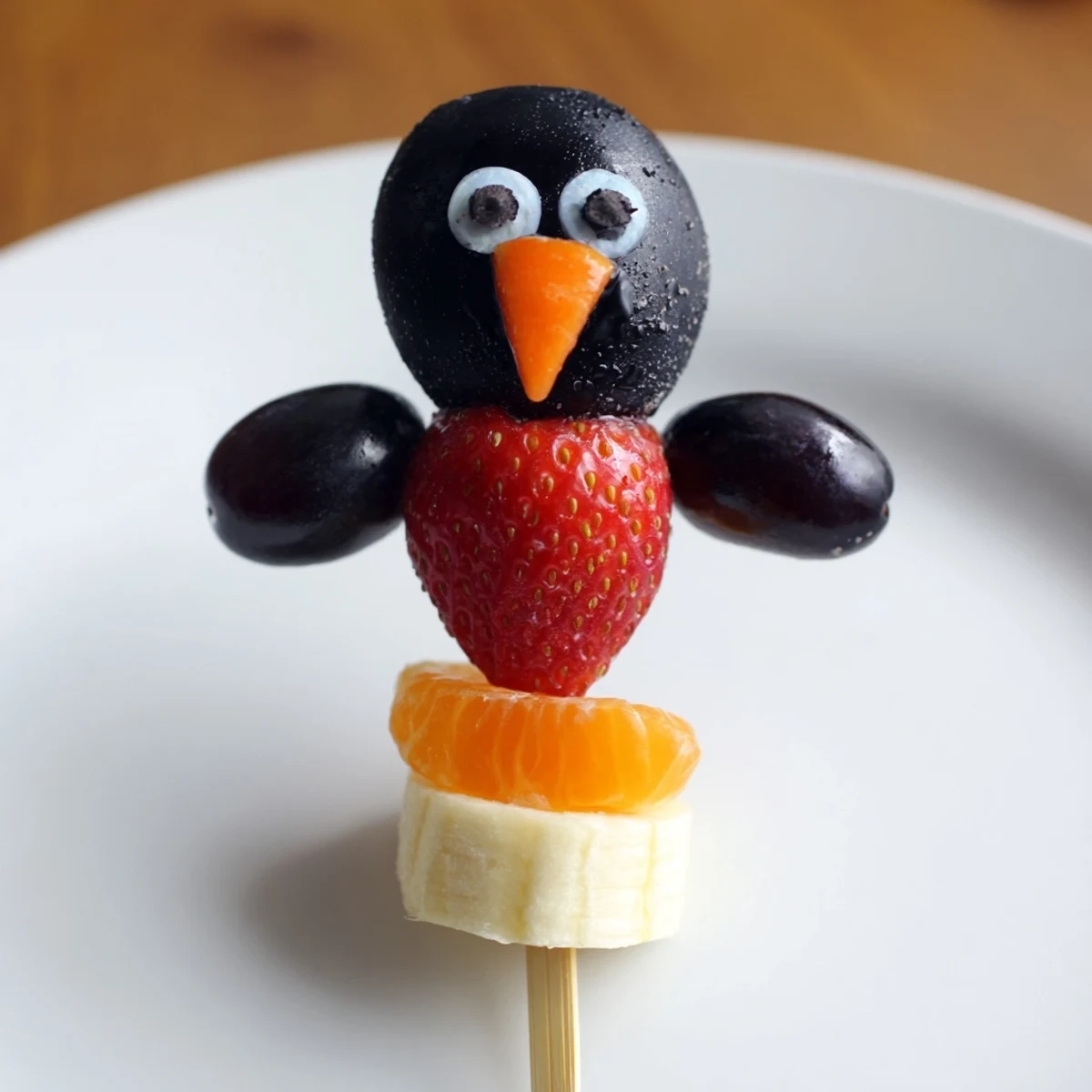 Adorable Penguin Fruit Skewer Army snack, showcasing playful penguins made of fresh, juicy fruit.