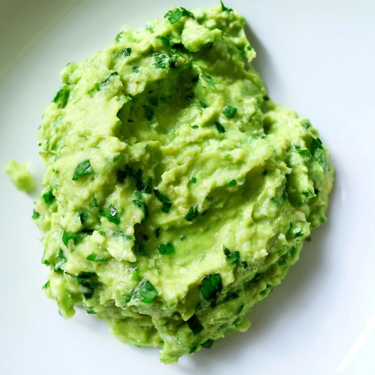A close-up view of creamy Avocado Lime Dip, a perfect appetizer with a hint of lime.