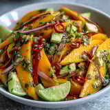 Serve this Refreshing Mango Salad with Lime Dressing alongside grilled fish or chicken for a quick summer lunch.