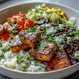 Healthy Mexican-inspired Meal Prep Burrito Bowl Base featuring colorful bell peppers, crisp lettuce, and corn kernels ready for weekly meal prep.