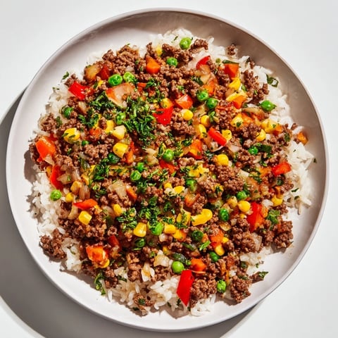 Ground Beef Skillet with Veggies: Fragrant rice and savory ground beef create a delicious one-pan meal.