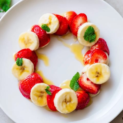 Festive and fun, this banana strawberry candy cane offers a delicious, healthy holiday snack for the kids.