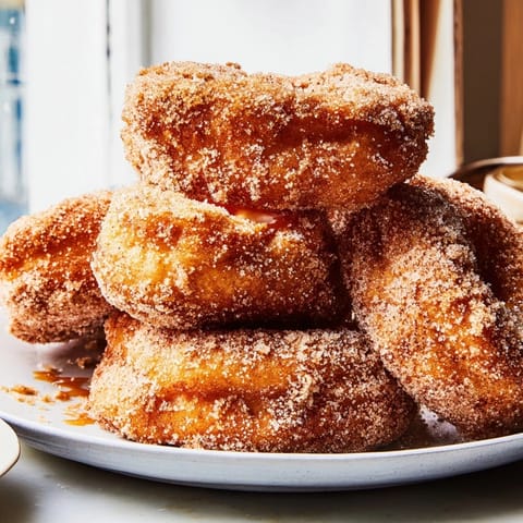 Air Fryer Pasta Christmas Crack, crispy bowtie pasta coated in cinnamon sugar, perfect festive party food.