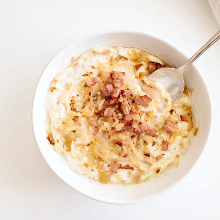 Golden caramelized onions and crispy bacon blend beautifully in this savory Caramelized Onion and Bacon Dip.